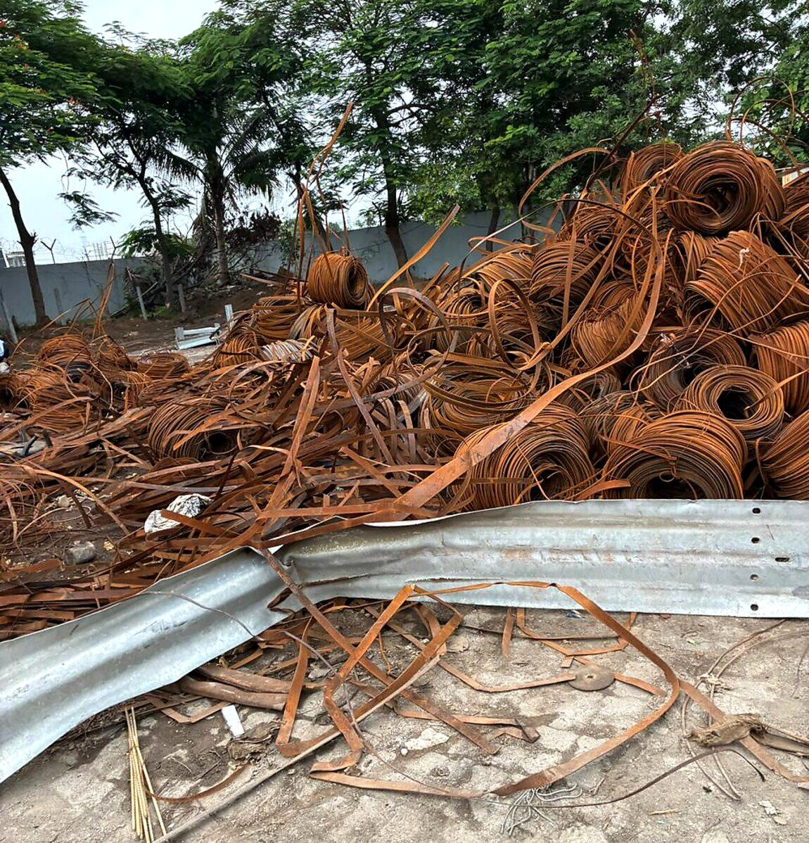 Recovered steel strapping coils stacked in the yard